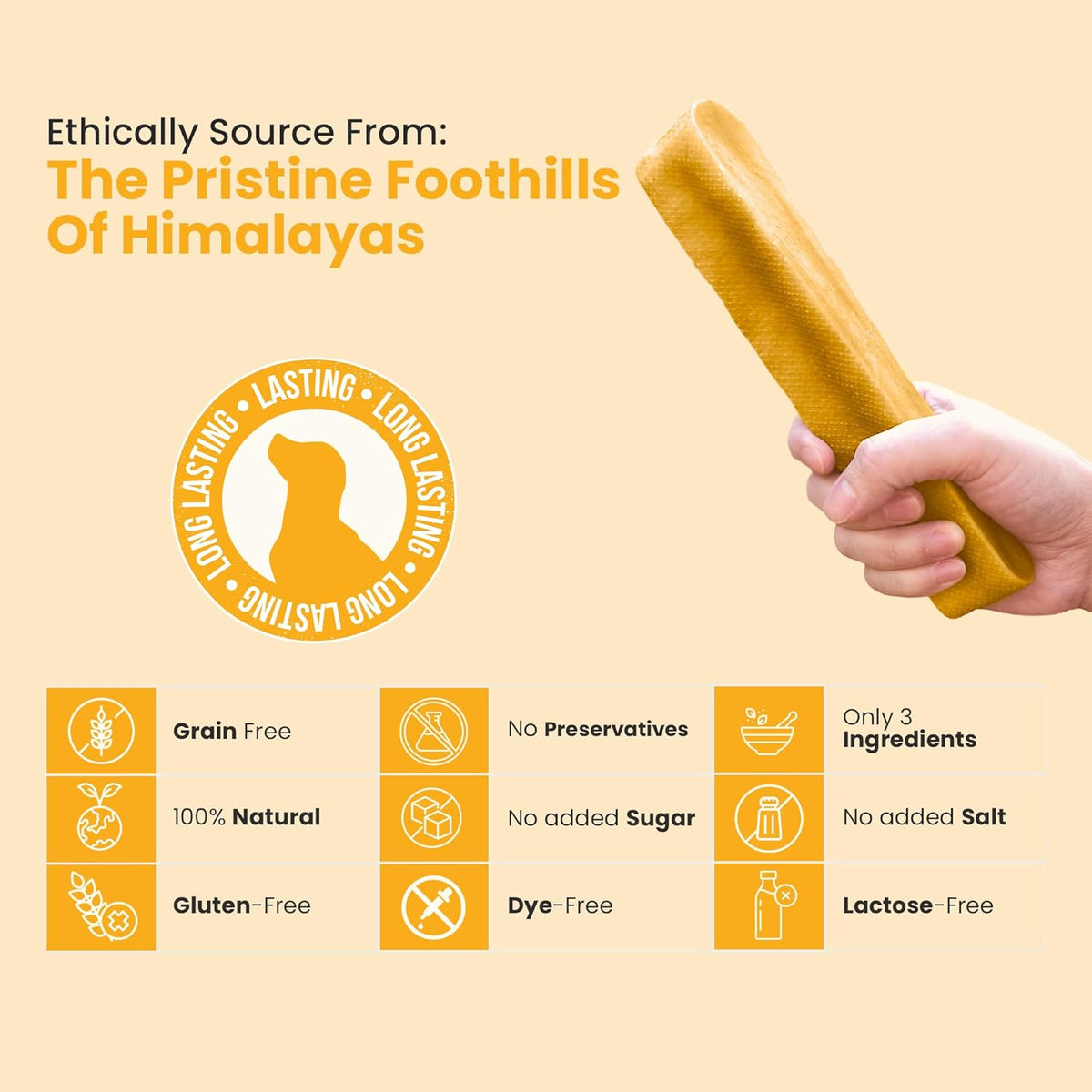Hand holding a turmeric flavored Himalayan yak cheese dog cheese chew showing natural ingredient benefits- Natural Dog Chew by Kathmandus